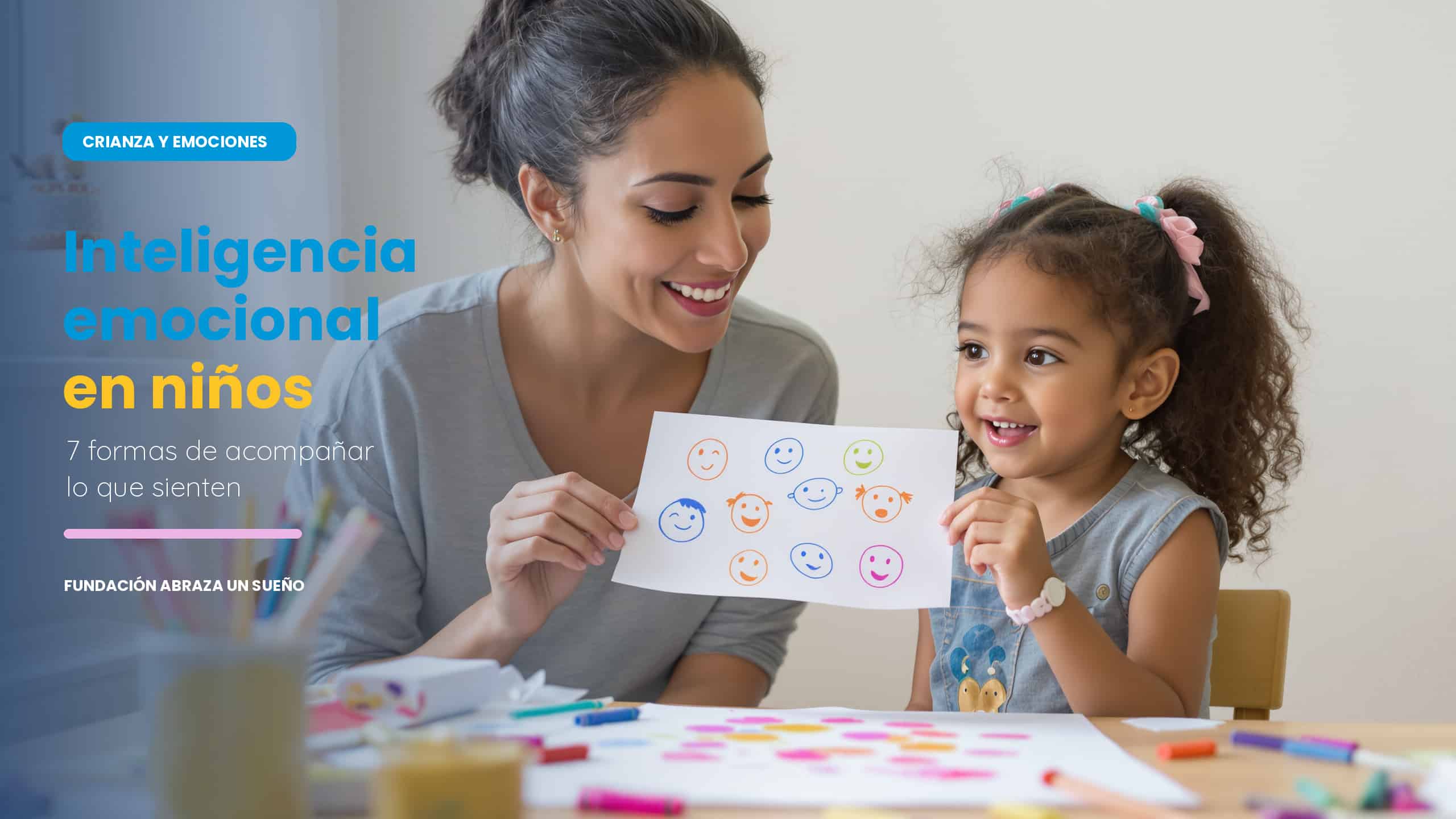 Una cuidadora escucha con atención a una niña que le muestra un dibujo sobre sus emociones